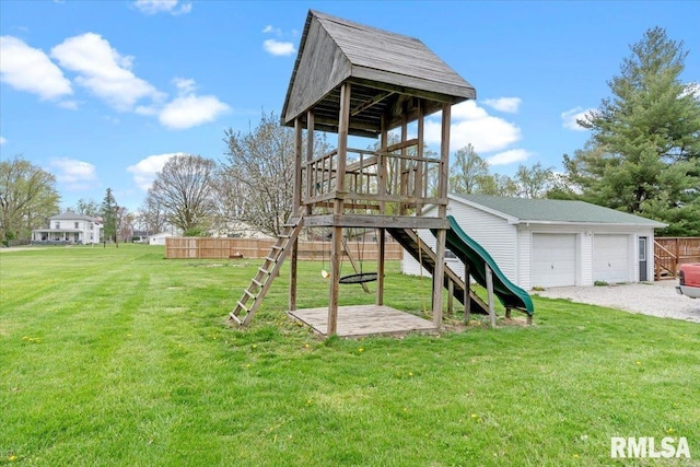 exterior space featuring an outbuilding, a lawn, and fence