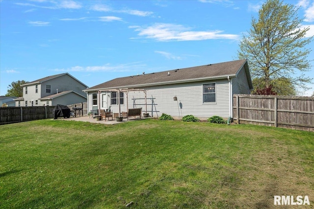 rear view of house featuring a fenced backyard, a pergola, a lawn, and a patio