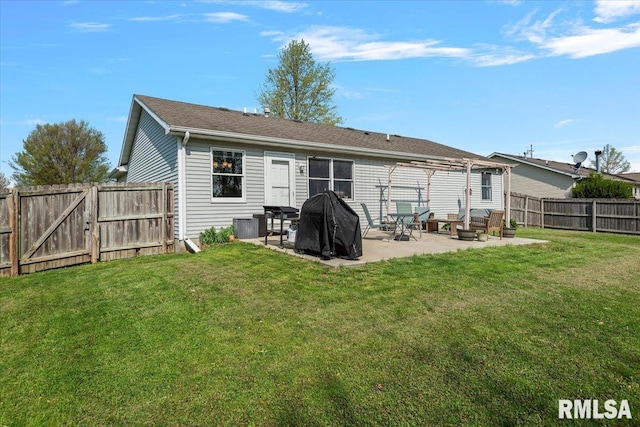 back of property featuring a yard, a patio, a gate, and a fenced backyard