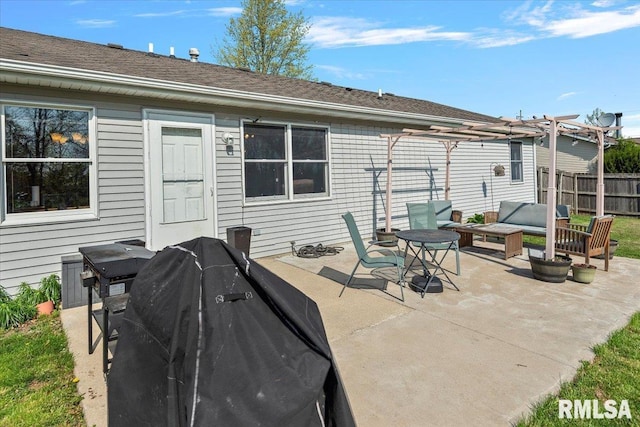 back of property with fence, a pergola, a shingled roof, an outdoor living space, and a patio area