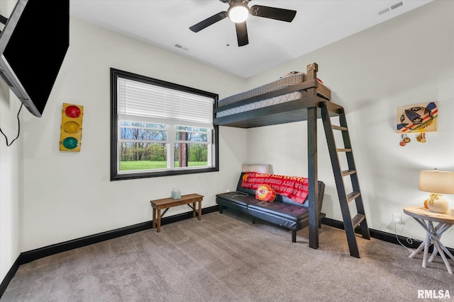 bedroom featuring carpet flooring, a ceiling fan, visible vents, and baseboards