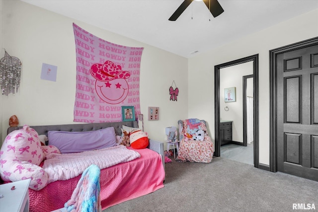 carpeted bedroom with a ceiling fan