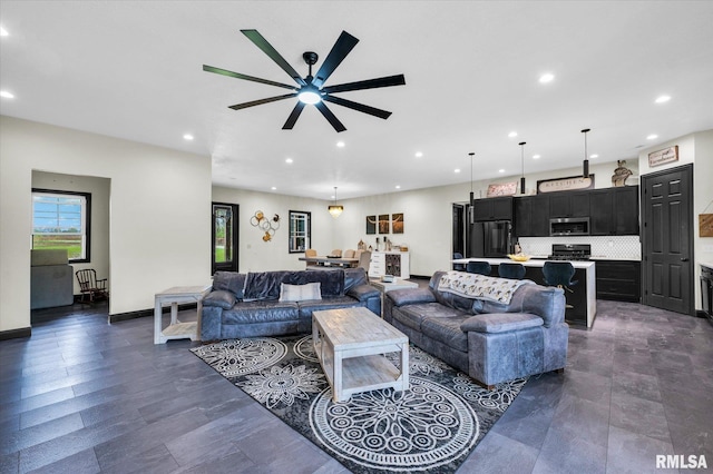 living room with recessed lighting and ceiling fan