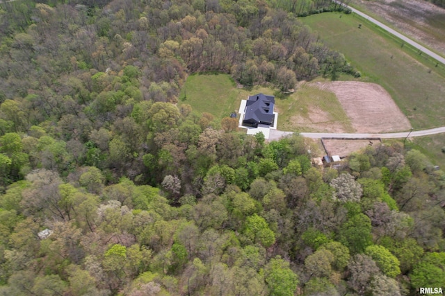 aerial view with a wooded view