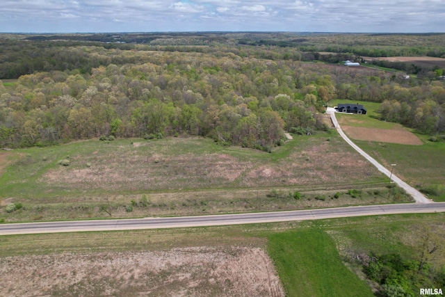 aerial view featuring a forest view