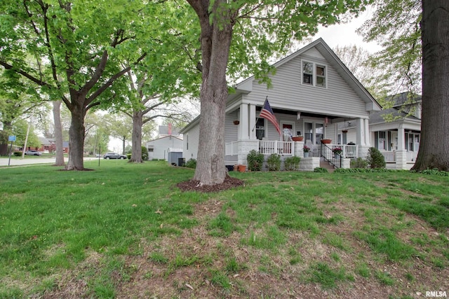 728 N 22nd St, Quincy, IL 62301 - view of front facade with a front yard and covered porch