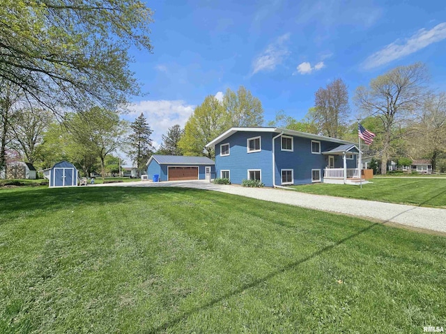 exterior space featuring an outbuilding, a storage shed, a front yard, and a garage