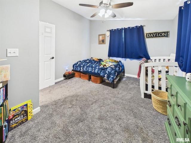 carpeted bedroom featuring a ceiling fan and baseboards