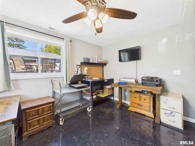office area featuring baseboards, visible vents, and a ceiling fan