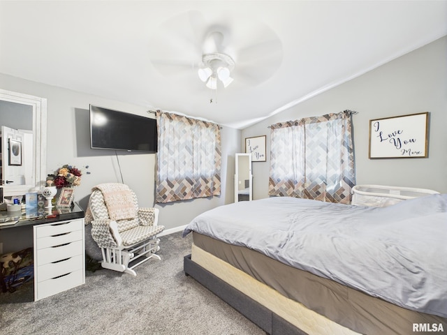 bedroom featuring lofted ceiling, a ceiling fan, and carpet