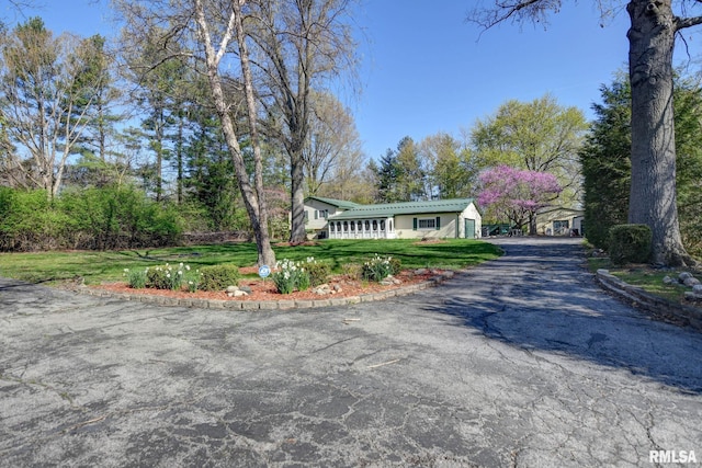 view of front of home with a front yard