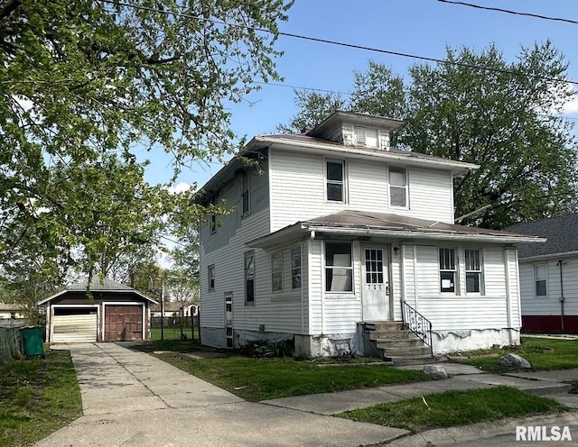 705 Olive St, Galesburg, IL 61401 - american foursquare style home featuring fence, an outdoor structure, a detached garage, and entry steps