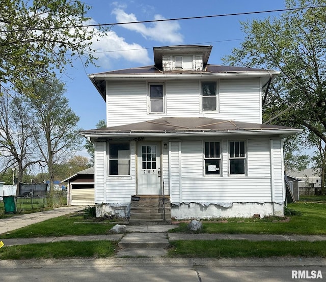 705 Olive St, Galesburg, IL 61401 - traditional style home with a garage, entry steps, and an outdoor structure