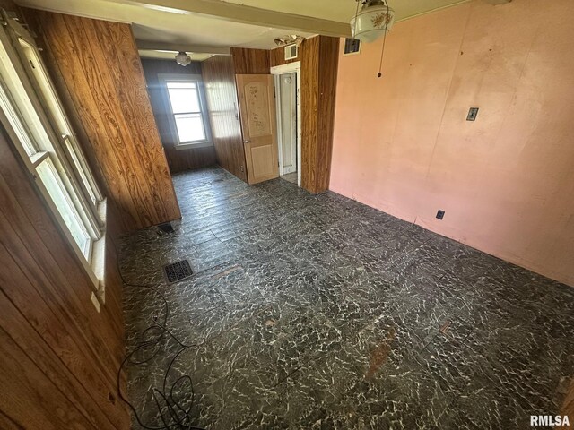 705 Olive St, Galesburg, IL 61401 - empty room with visible vents and wood walls