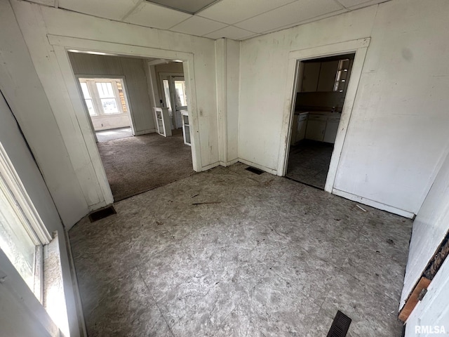 705 Olive St, Galesburg, IL 61401 - unfurnished bedroom featuring visible vents, ensuite bathroom, and a drop ceiling