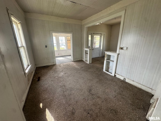 705 Olive St, Galesburg, IL 61401 - spare room featuring carpet flooring