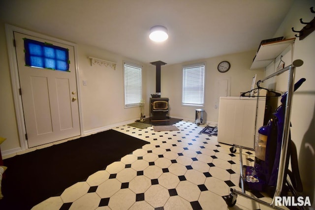22 Roundhouse Rd, Herod, IL 62947 - entrance foyer with tile patterned floors, baseboards, and a wood stove