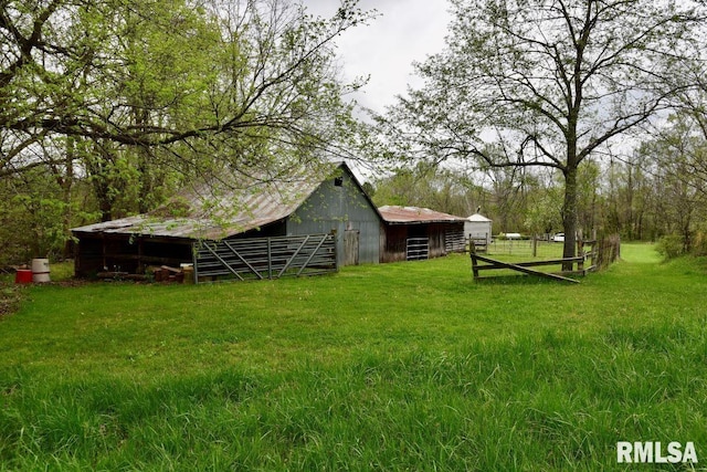 22 Roundhouse Rd, Herod, IL 62947 - view of yard with a barn, fence, and an outbuilding