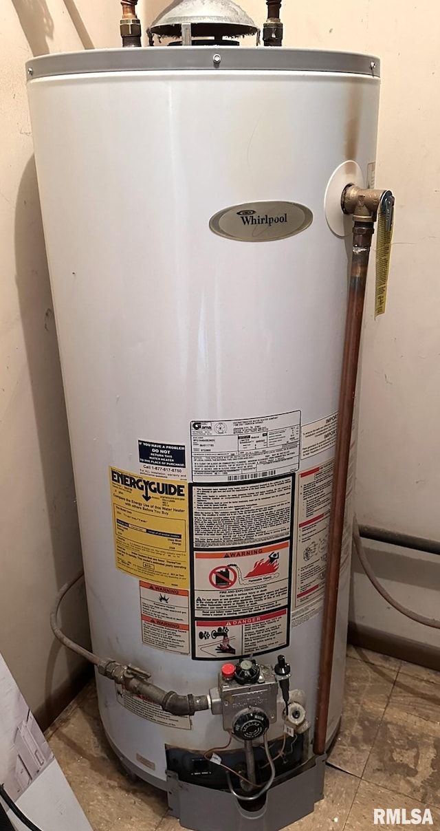 utility room with gas water heater
