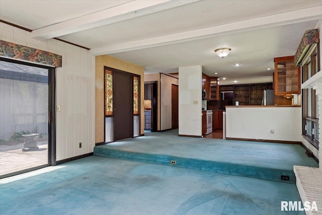 454 Brian Ln, Dawson, IL 62520 - unfurnished living room featuring carpet floors, recessed lighting, and beamed ceiling