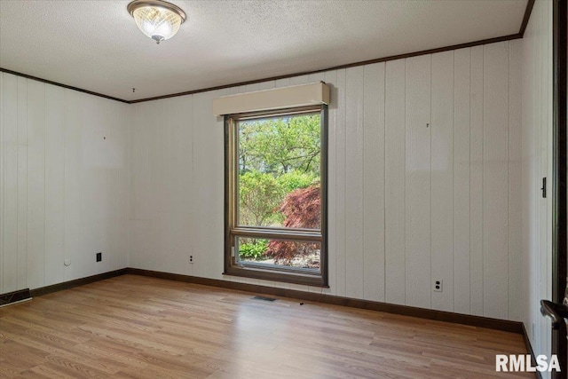 454 Brian Ln, Dawson, IL 62520 - unfurnished room featuring baseboards, visible vents, and light wood-style floors