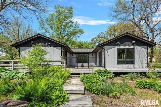 454 Brian Ln, Dawson, IL 62520 - back of house featuring a wooden deck and fence