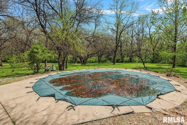 454 Brian Ln, Dawson, IL 62520 - view of swimming pool featuring a lawn and a covered pool