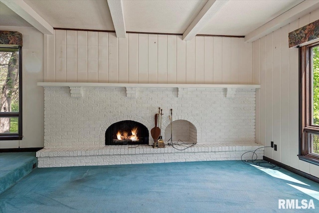 454 Brian Ln, Dawson, IL 62520 - interior details featuring beamed ceiling, wood walls, and carpet