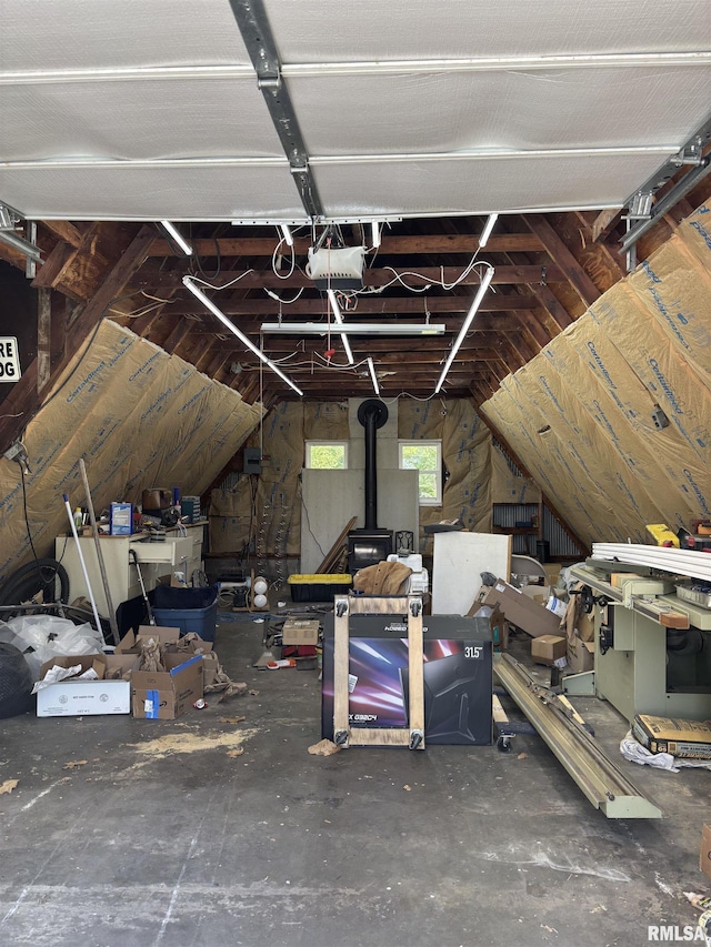 286 Kochs Ln, Meredosia, IL 62665 - garage featuring a garage door opener and a wood stove