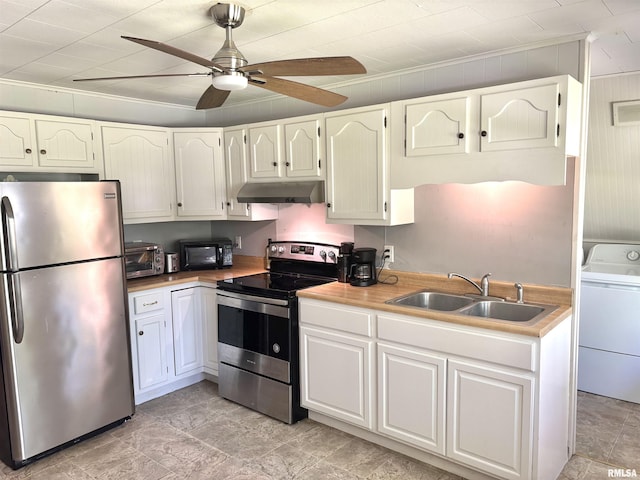 286 Kochs Ln, Meredosia, IL 62665 - kitchen featuring appliances with stainless steel finishes, under cabinet range hood, washer / clothes dryer, a sink, and a ceiling fan