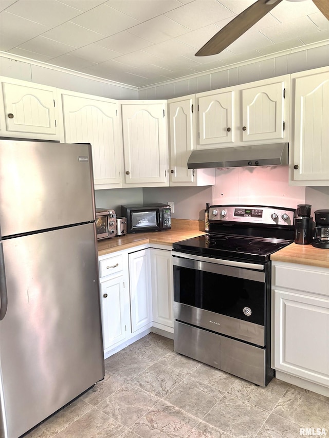 286 Kochs Ln, Meredosia, IL 62665 - kitchen with stainless steel appliances, under cabinet range hood, light countertops, light stone finish floors, and ornamental molding