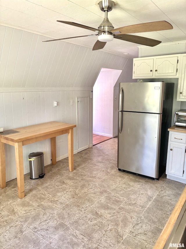 286 Kochs Ln, Meredosia, IL 62665 - kitchen with freestanding refrigerator, a ceiling fan, light stone finish flooring, lofted ceiling, and light countertops