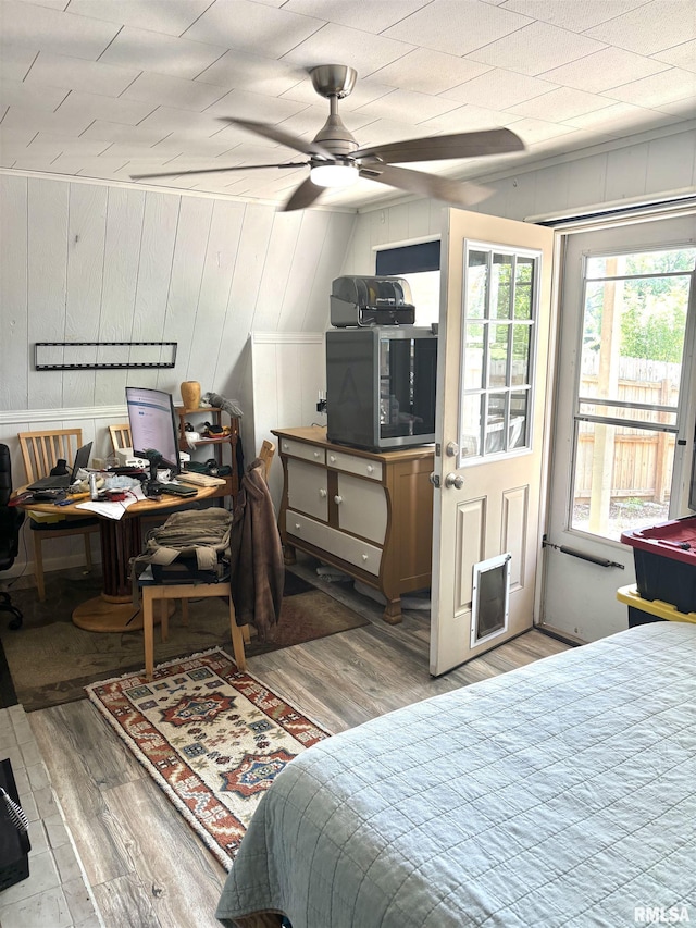286 Kochs Ln, Meredosia, IL 62665 - bedroom featuring wood finished floors and wooden walls