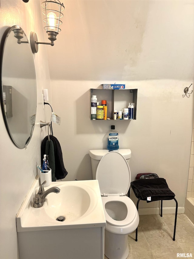 286 Kochs Ln, Meredosia, IL 62665 - bathroom featuring toilet, vanity, tile patterned floors, and baseboards