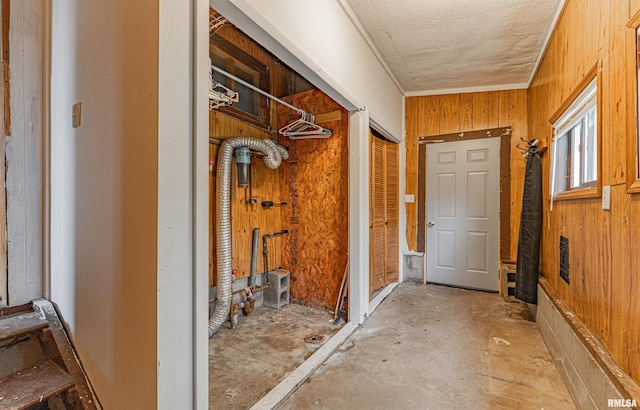 interior space featuring wood walls