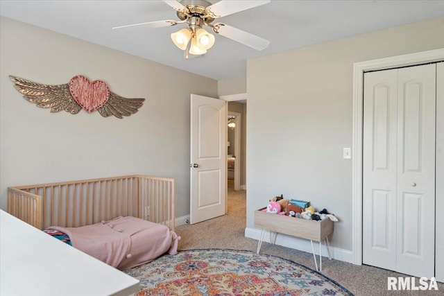 bedroom featuring carpet floors, baseboards, a closet, and ceiling fan