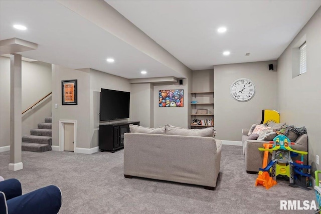 living area with recessed lighting, carpet flooring, stairs, and baseboards