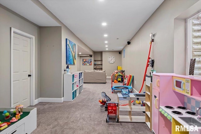 playroom with carpet flooring, recessed lighting, and baseboards