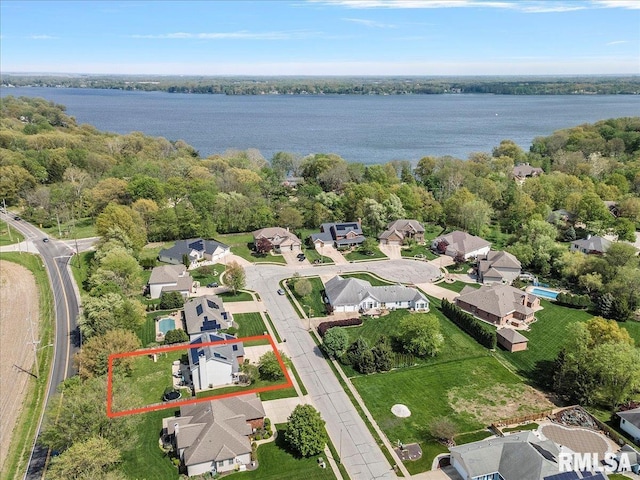 bird's eye view with a water view and a residential view