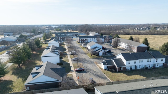 birds eye view of property with a residential view