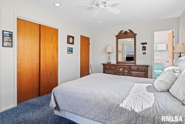 bedroom featuring carpet floors, ceiling fan, and a closet