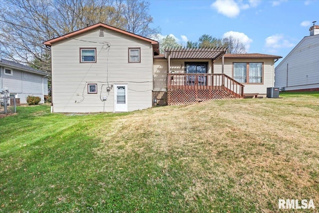 back of property with a yard, a pergola, cooling unit, and a deck