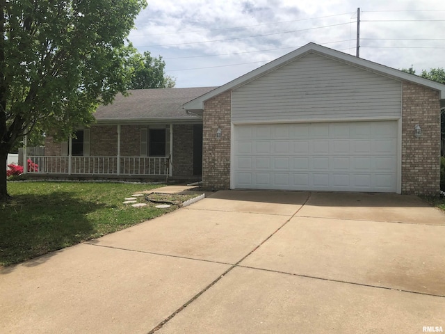 single story home with brick siding, a front lawn, driveway, and a porch