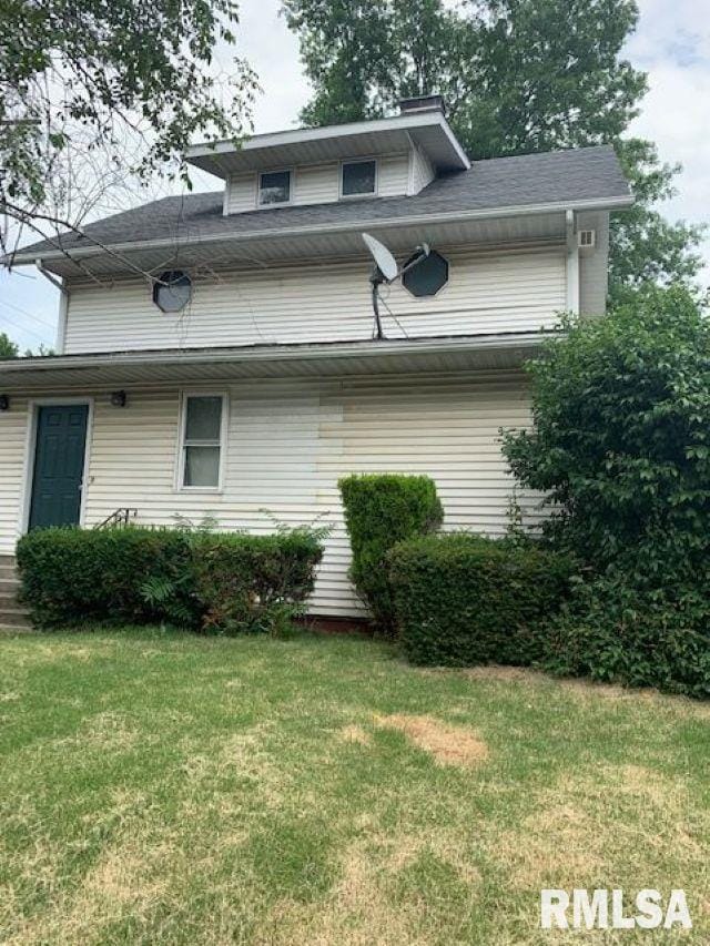 400-402 E Laurel, Springfield, IL 62704 - view of property exterior with a lawn