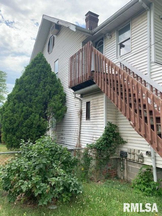400-402 E Laurel, Springfield, IL 62704 - view of home's exterior with stairway and a chimney
