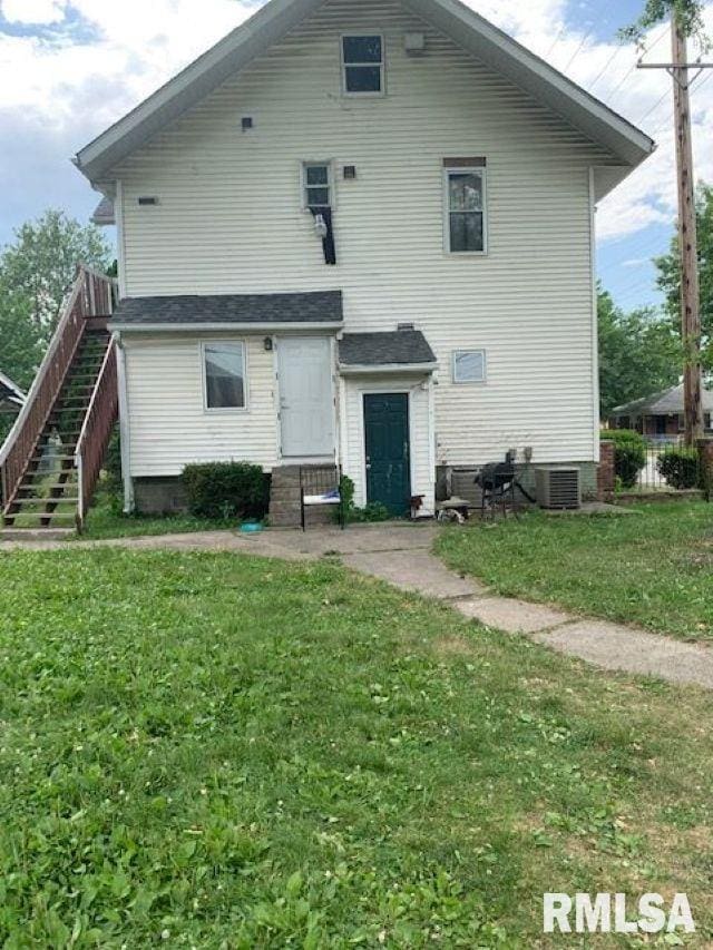 400-402 E Laurel, Springfield, IL 62704 - back of house featuring central AC, a yard, and entry steps
