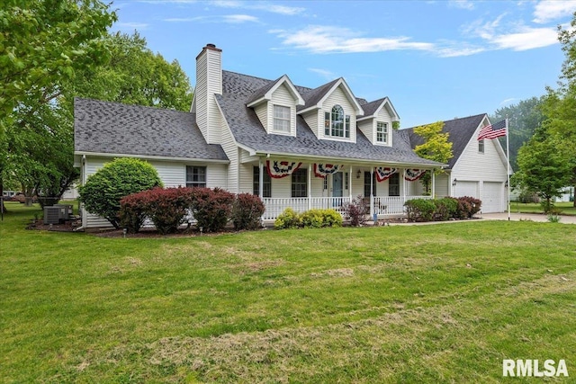 3300 Winch Rd, Springfield, IL 62707 - cape cod home featuring a porch, a garage, a front yard, and central AC