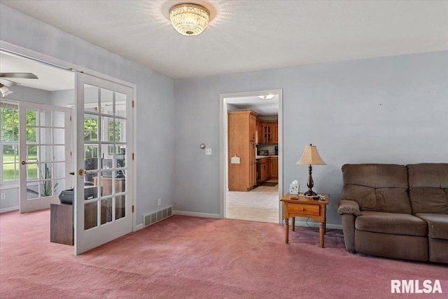 3300 Winch Rd, Springfield, IL 62707 - living room with carpet floors, baseboards, ceiling fan, and french doors