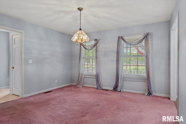 3300 Winch Rd, Springfield, IL 62707 - spare room featuring a chandelier, light carpet, and baseboards