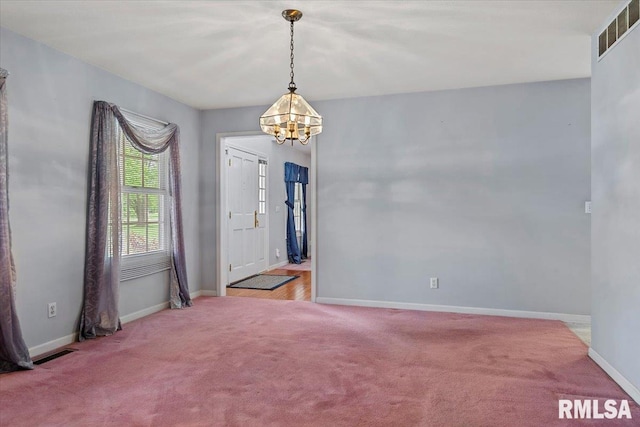 3300 Winch Rd, Springfield, IL 62707 - foyer featuring a chandelier, light carpet, and baseboards